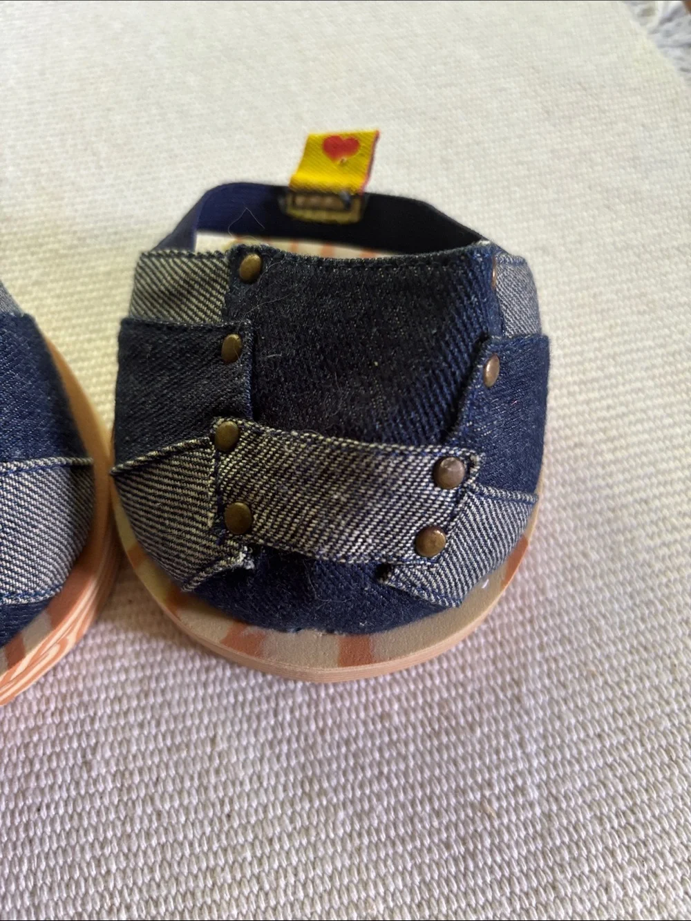 Build-A-Bear Workshop denim patchwork sandals featuring studs & faux wood soles.
